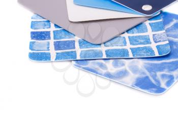Swimming pool coating color samples on white background.
