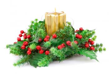 Christmas candle and decoration isolated on white background.