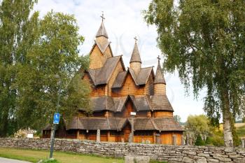 Old Heddal Stave church and cemetery in Norwegian village.