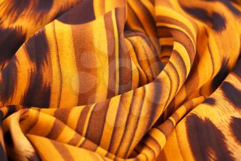 Colorful striped fabric as a background.
