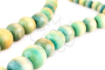 Necklace with wooden beads isolated on white background.