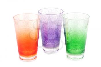 Colorful plastic glasses isolated on white background.