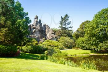Landscape with rock and lake in Hagenbeck zoo in Hamburg, Germany.