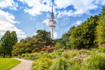 View of the Planten un Blomen Park and TV tower in Hamburg, the popular relaxing and sporting place, Germany.
