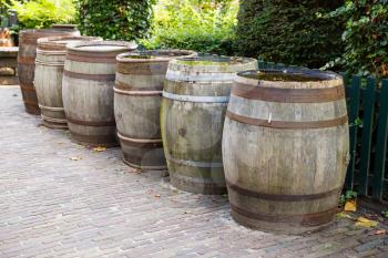 Old wooden barrels in the traditional Dutch village.