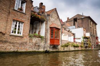 The traditional medieval houses at the canal in Bruges city, Belgium.