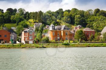 Houses in Dinant, view from Meuse river in Belgium.