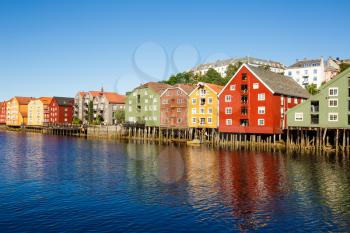 Colorful old houses at the Nidelva river embankment in Trondheim, Norway.