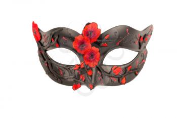 Black carnival mask with red ornament isolated on a white background.