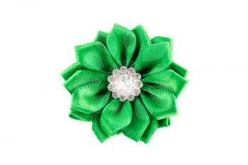 Green fabric flower with stones isolated on white background.