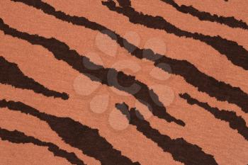 Brown fabric texture with pattern as a background.