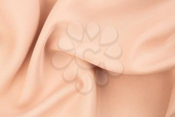 Beige fabric texture as a background, horizontal image.