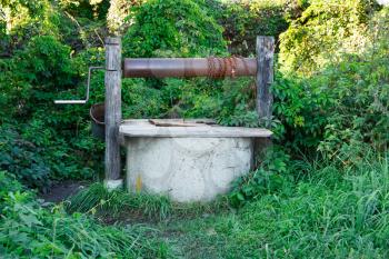 Old water well in the Russian village.