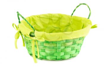 Green empty wicker basket isolated on white background.