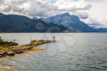 Landscapoe with mountains and fjord in Norway.