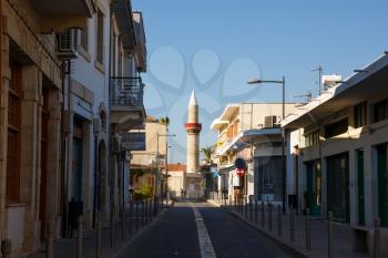 Limassol, Cyprus - February 4, 2016 - Beautiful old street with mosque in the historic center of the town.