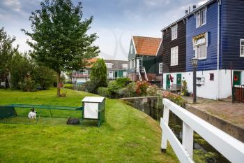 The old traditional colorful houses at the canal in the Dutch fisherman village.