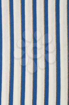 Blue and white fabric texture with pattern as a background.