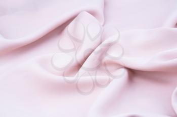 Pink fabric texture as a background, horizontal image.