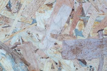 Wooden oriented strand board texture as a background.