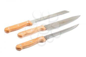 Three kitchen knives with wooden handle isolated on white background.