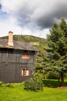 Old wooden house in the rural place in Norway.