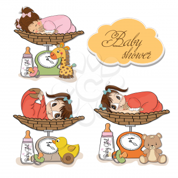 baby girl on on weighing scale, items set on white background