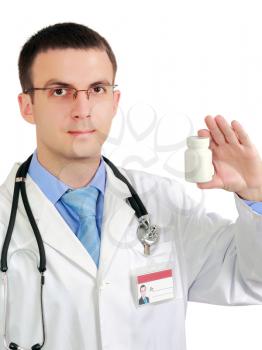 Friendly medical doctor with blank pill's bottle. Close-Up. Isolated over white background.