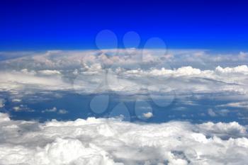 Beautiful view above the earth at the clouds below.