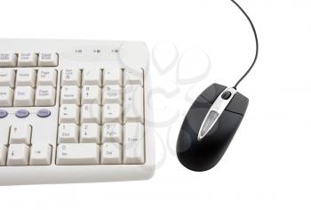 Black computer mouse and part of keyboard on white background. Isolated.