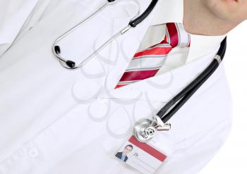 Fragment medical doctor's smock with stethoscope. Isolated over white