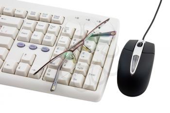 Black computer mouse and part of keyboard on white background. Isolated.