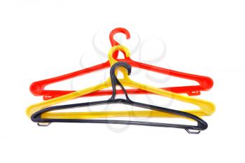 Red clothes hanger isolated over white.