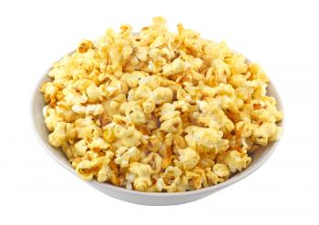 Bowl full of caramel popcorn isolated on white background.