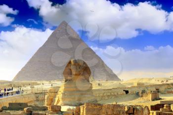 Ancient Great Pyramids and present day of Giza town,suburb of Cairo city.  Egypt.
