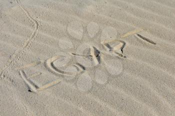 Inscription  Egypt on a sand on a  beach.