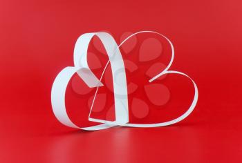 St. Valentine Day. Two hearts,on red background.