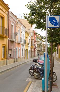 Small typical street in cozy Spanish town. Catalonia.