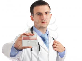 Friendly medical doctor with blank mediical ID's card .Isolated over white background