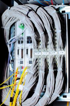 Telecommunication equipment of network cables in a datacenter of mobile operator.