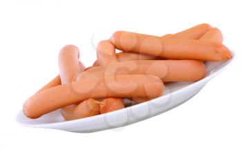A fresh sausage on white plate . Isolated over white.