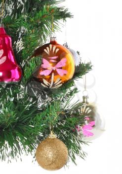 Fragment -Christmas and New Year decoration-glass balls on fir branches. Close -up. Isolated
