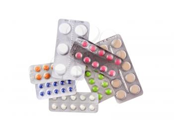 Coloured pills on white background. Isolated over white