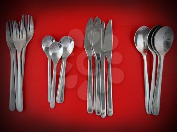 Table serving-knife,plate,fork and   on  red background.