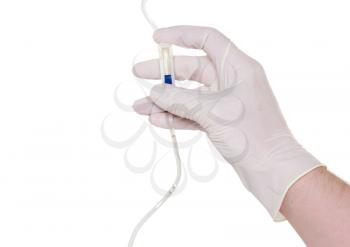 Hand in medical gloves, disposable infusion set. White background
