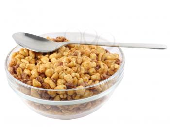 Glass bowl with cold cereal flakes. Isolated over white