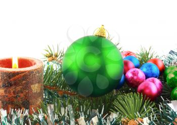Christmas and New Year decoration- balls, tinsel, candels. Isolated on the white background