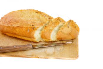 Fresh cutting bread. Isolated over white