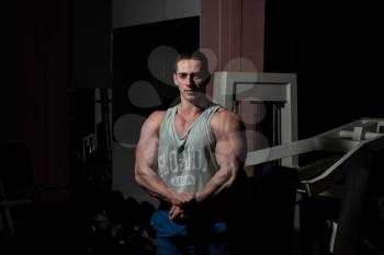 young bodybuilder showing his upper body