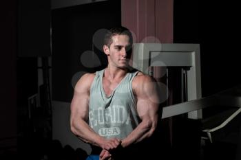 young bodybuilder showing his upper body